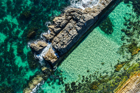 A breathtaking aerial view of Forster on the Mid North Coast of New South Wales, showcasing turquoise ocean waters, white sandy beaches, and the bridge linking Forster and Tuncurryの写真素材