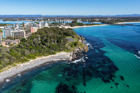 A breathtaking aerial view of Forster on the Mid North Coast of New South Wales, showcasing ocean waters, white sandy beaches, and the bridge linking Forster and Tuncurryの写真素材