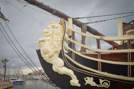 Alicante, Spain - October, 29, 2015: Bow of Spanish "Santisima Trinidad" galleon with lion. Historical armada ship of 16-18th centuries in Alicante port.のeditorial素材