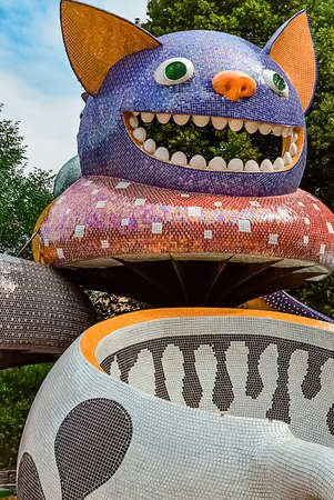Kiev, Ukraine - July 13,2015: Children Landscape Park with modern sculptures and installations made by Konstantin Skretutskiy. Sculpture of mosaic fly agaric with head of cat.のeditorial素材