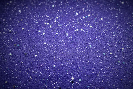 Purple felt background with silver glitter.の写真素材