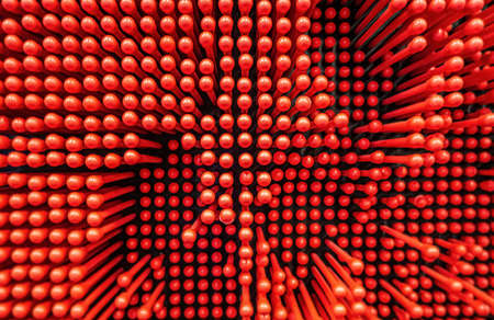 Background with plastic red balls on sticks.