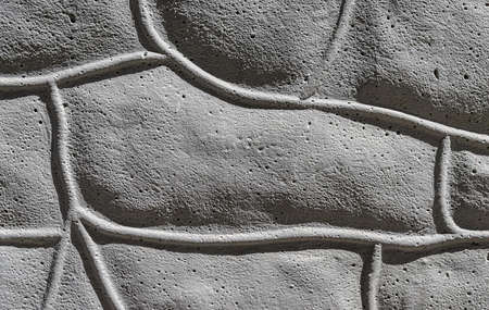 Gray porous cement texture with imitation of bricks.の写真素材