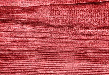 Red wooden board texture with stripes.の写真素材