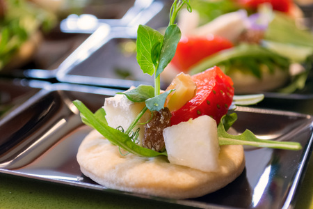Cookie with fruit, cheese, nuts, raisins and salad