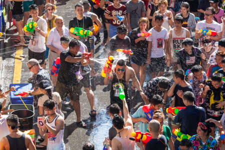 Bangkok - April 14: Songkran Festival in Bangkok Silom on April 14, 2017 in Thailand. Tourists...