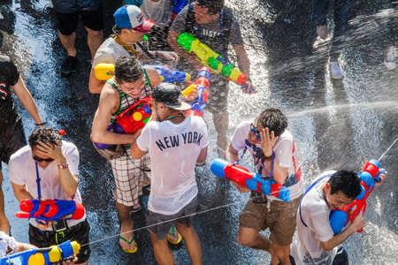 Bangkok - April 14: Songkran Festival in Bangkok Silom on April 14, 2017 in Thailand. Tourists...