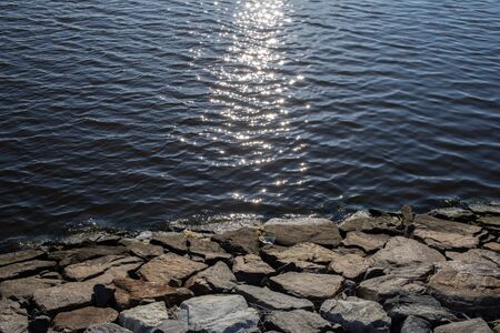the sun's rays on the calm riverの写真素材