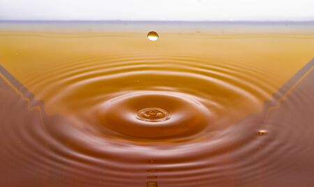rippling after a few drops of Whiskey.の写真素材