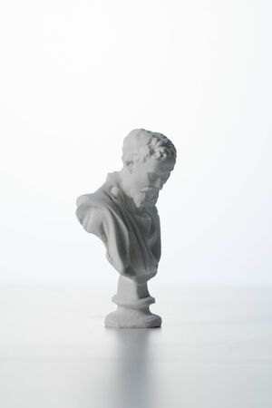 Michelangelo plaster figure in white backgroundの写真素材