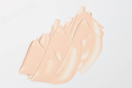 Shades Of Foundation On White Background. Makeup Product Texture.