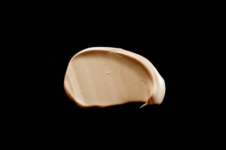 the texture of a foundation liquid. Black background.の写真素材