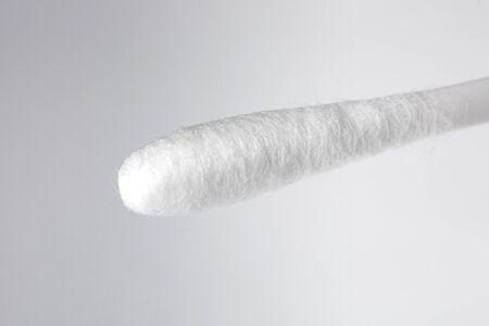 Cotton Swab with wool fibers closeupの写真素材