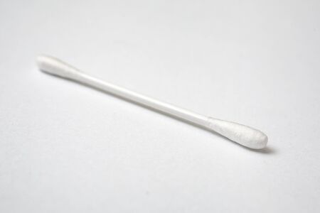 Cotton Swab with wool fibers closeupの写真素材