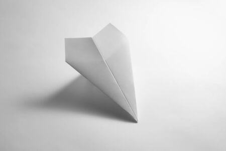 paper airplane on gray background.の写真素材