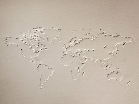 a world map made of embossing paperの写真素材