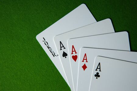 Joker card and four A cards.