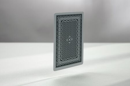 Back side of playing card. a dark backgroundの写真素材