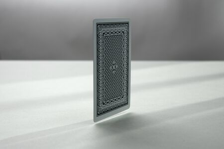 Back side of playing card. a dark backgroundの写真素材