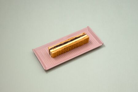 Japanese cuisine with red bean concoction and butter in bread.