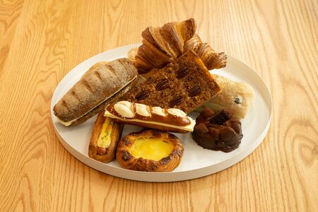 a plate of various kinds of breadの写真素材