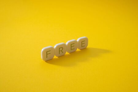 Alphabet free word block with yellow background.の写真素材