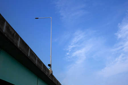 the sectional division of the sky, bridges, and streetlamps.