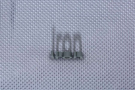 Words on a Steel texture background. iron blocks and shadows. 3D rendering.の写真素材