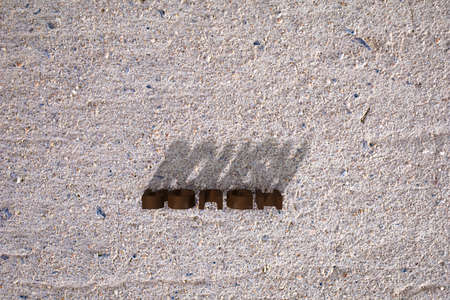 Words on a Concrete texture background. ROUGH words blocks and shadows. 3D rendering.の写真素材