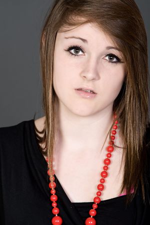 Shot of a Pretty Teenager with a Worried Look on her Faceの写真素材