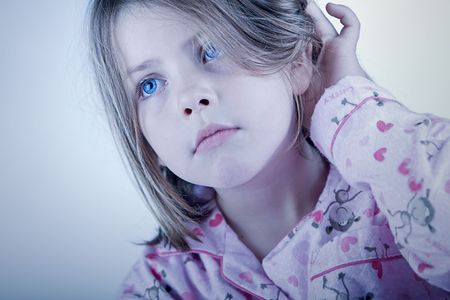 Shot of a Cute Blonde Child in her Pyjamasの写真素材