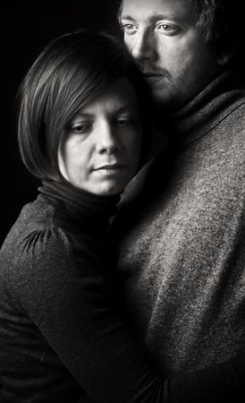 Low Key Shot of a Couple Embracingの写真素材