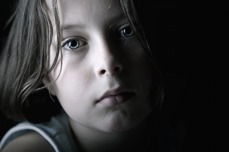 Low Key Shot of Sad Child Low Key Shot of Sad Child