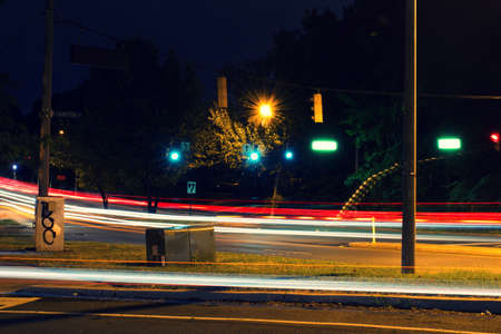 Light trail from vehicles traveling on the road
