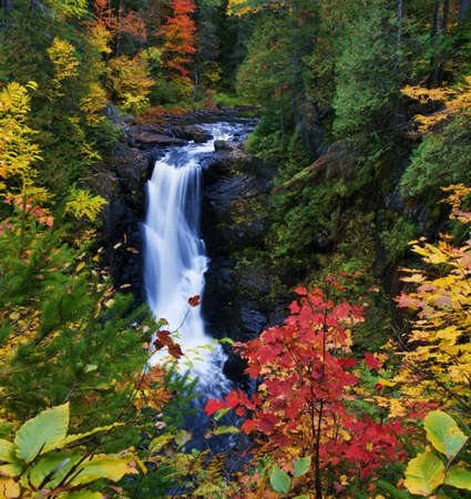 Moxie Falls in Maine USA surrounded by fall foliage