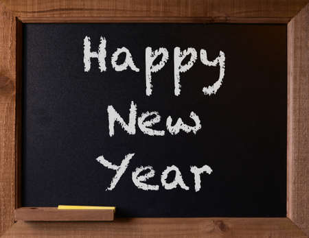 Holiday Greeting on Chalkboard, Happy new Yearの写真素材