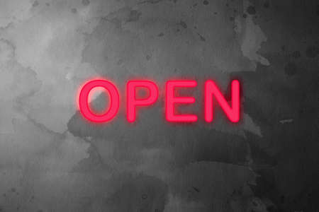 Neon Lettering against Greyscale backgroundの写真素材