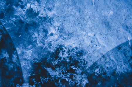 Close up of blue glaicer ice, in Icelandic ice cave during winter.の写真素材