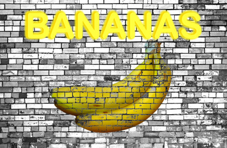 Photo of bright yellow Bananas overlaid with black and white brick wall, with neon text bananasの写真素材