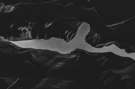 Antelope Slot Canyon in Paige Arizona close up to rock walls creating abstract shapes.