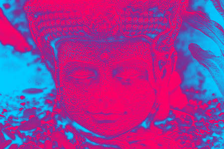 Abstract photo edit of a stone carved Face in the style of a Cambodian Warrior.の写真素材