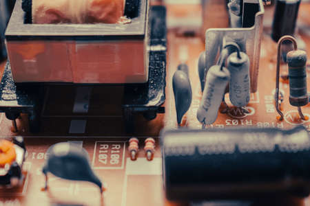 A closeup on part of a DVD player circuit boardの写真素材