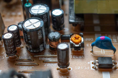 A closeup on part of a DVD player circuit board