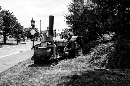 Black and white photo of an old steam engine in a parkの写真素材