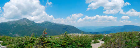 View from Mt Washington NH on a sunny summer day, edited to look like a painting.の写真素材