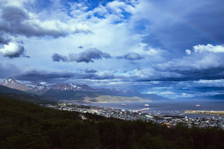 Evening look at the city of Ushuaia,  between the Andres mountains and saltwater Harbor.の写真素材