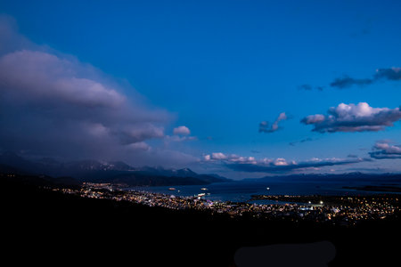 Evening look at the city of Ushuaia,  between the Andres mountains and saltwater Harbor.の写真素材