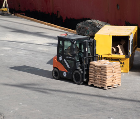 Forklift loading bulk cargo by forklift at the port.の写真素材