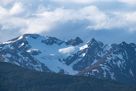 Mountain landscape with snow and blue sky.の写真素材