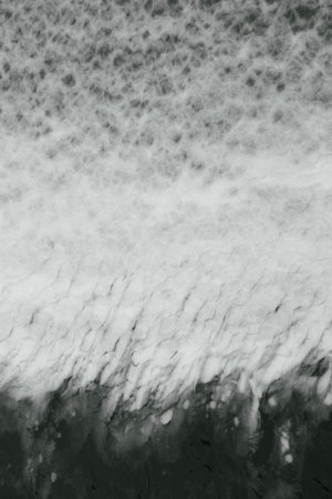 abstract black and white grunge background texture with water and iceの写真素材